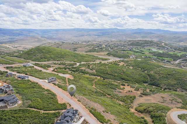 2042 East Wrangler Road, Unit 19 Kamas, UT 84036 - Photo 10 of 14 Drone / aerial view of a mountain backdrop