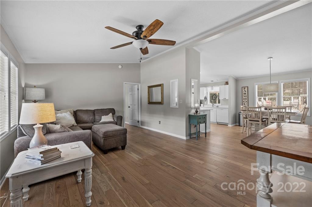 11008 Asbury Chapel Road Huntersville, NC 28078 - Photo 11 of 45 a living room with furniture and wooden floor