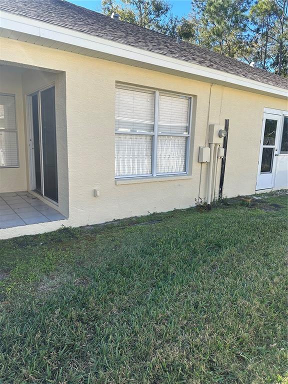 658 Green Valley Road, Unit B3 Palm Harbor, FL 34683 - Photo 12 of 24 a view of an house with backyard space and balcony