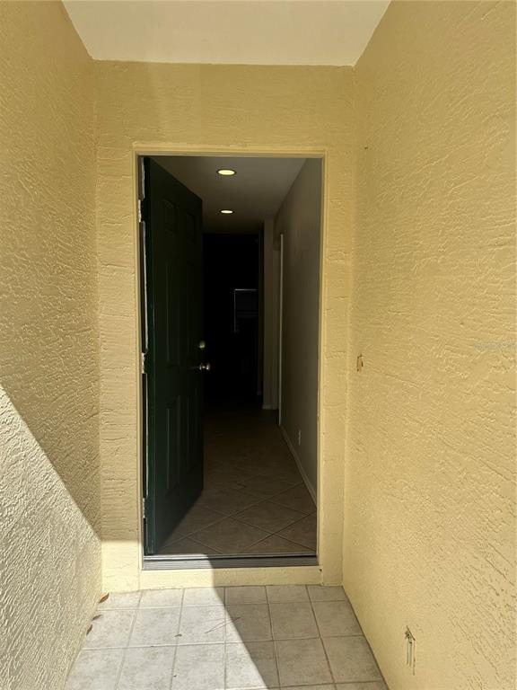 658 Green Valley Road, Unit B3 Palm Harbor, FL 34683 - Photo 4 of 24 a view of a hallway