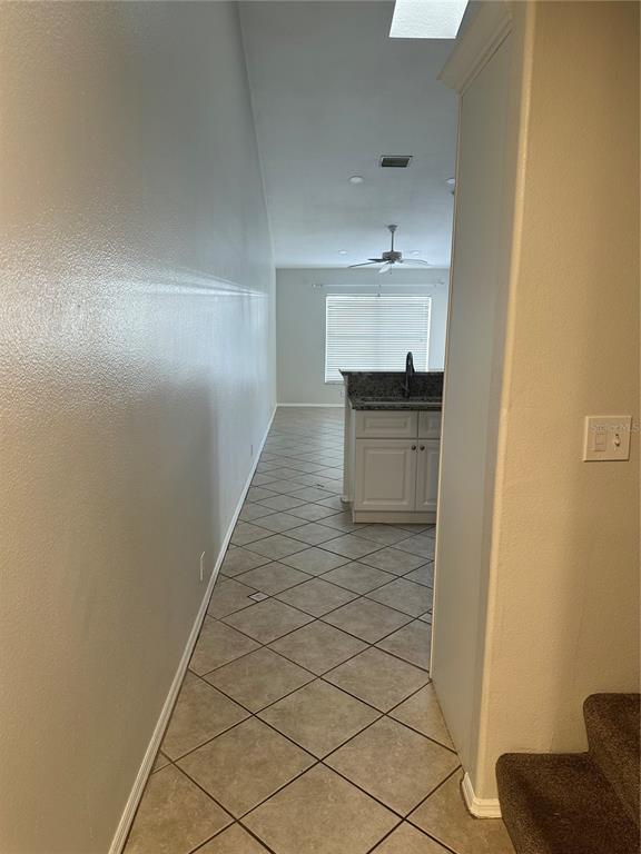 658 Green Valley Road, Unit B3 Palm Harbor, FL 34683 - Photo 5 of 24 a bathroom with a sink and a mirror