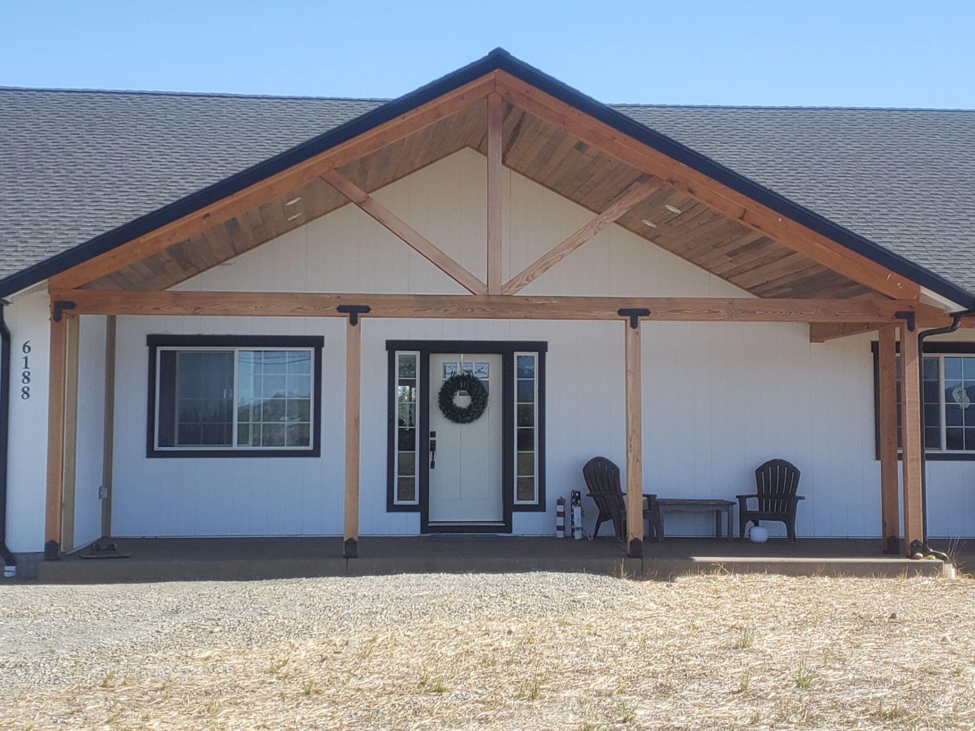 6188 Upton Road Central Point, OR 97502 - Photo 2 of 10 a view of empty room with windows