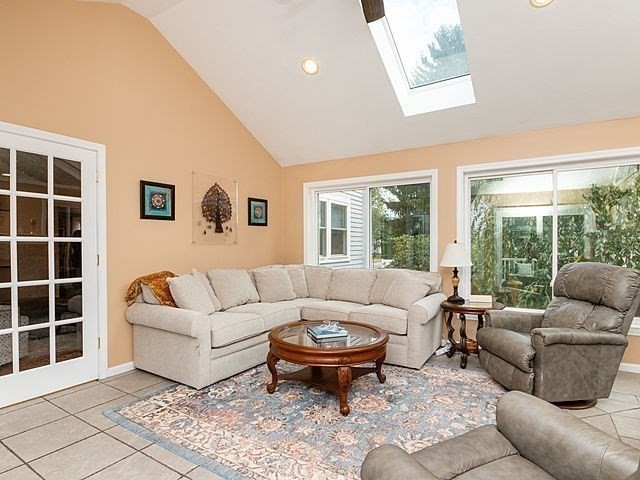 120 Hanson Road Newton, MA 02459 - Photo 15 of 33 a living room with furniture and a large window
