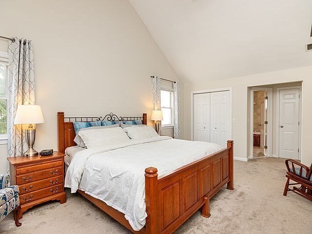 120 Hanson Road Newton, MA 02459 - Photo 16 of 33 a bed room with a bed and a chair