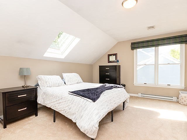 120 Hanson Road Newton, MA 02459 - Photo 17 of 33 a bedroom with a bed and a tv