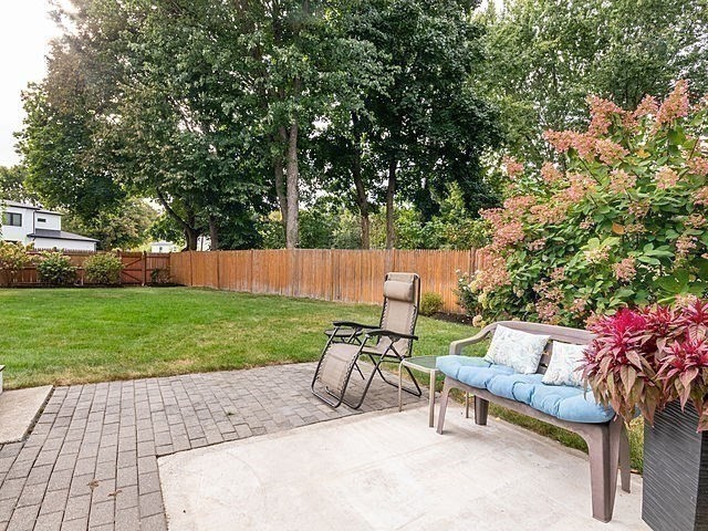 120 Hanson Road Newton, MA 02459 - Photo 24 of 33 a view of backyard with seating and green space