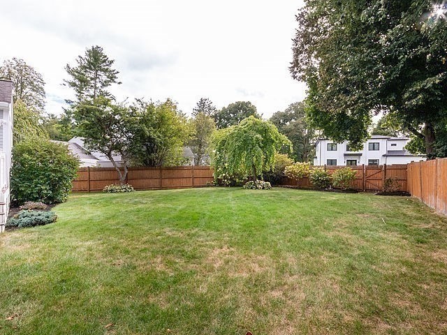 120 Hanson Road Newton, MA 02459 - Photo 25 of 33 a view of a backyard with large trees