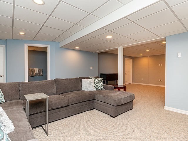 120 Hanson Road Newton, MA 02459 - Photo 26 of 33 a living room with furniture and a potted plant