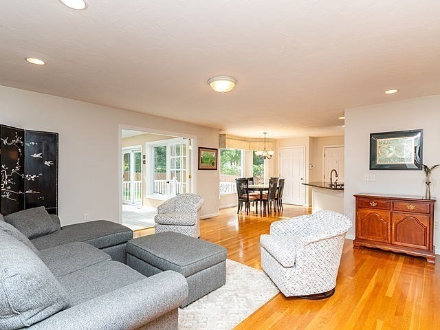 120 Hanson Road Newton, MA 02459 - Photo 8 of 33 a living room with furniture and a large window