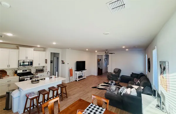 a living room with furniture and a couch