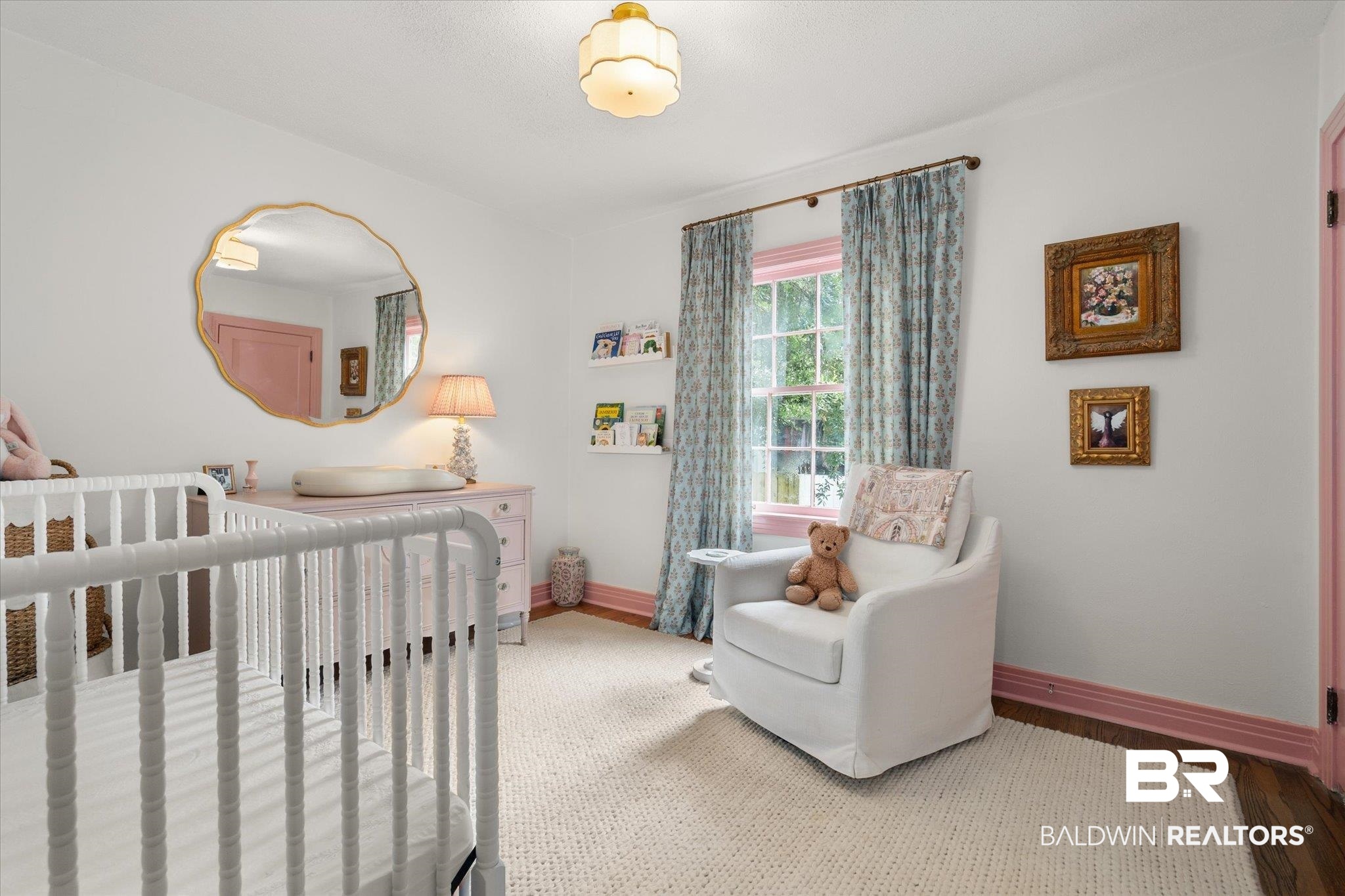 165 Crenshaw Street Mobile, AL 36606 - Photo 15 of 21 Bedroom with a nursery area and wood finished floors