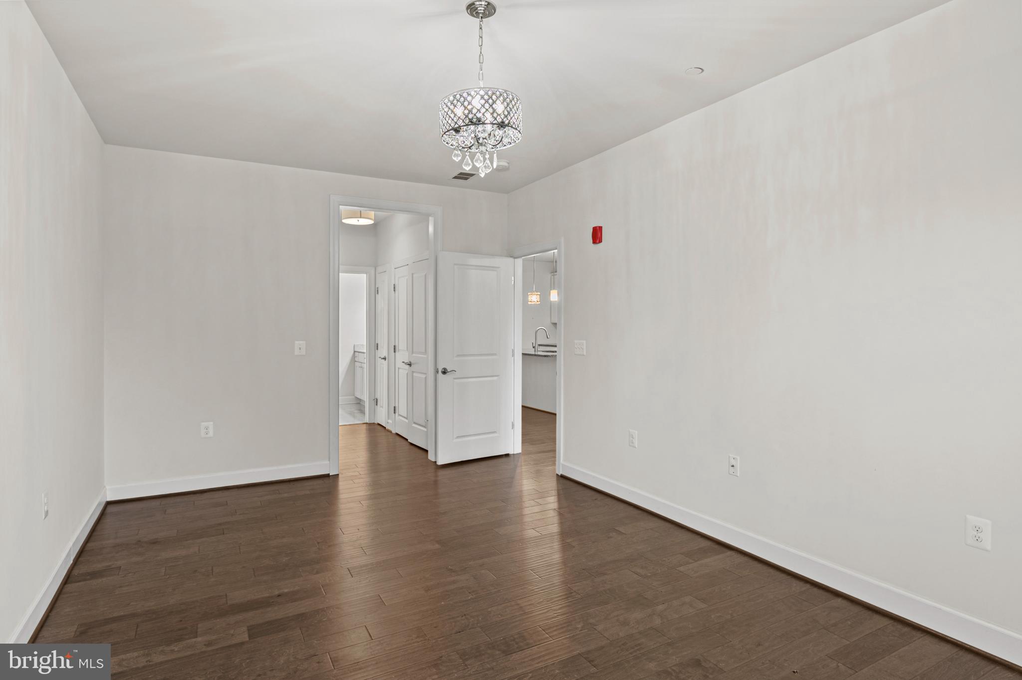 10530 Resort Road, Unit 110 Ellicott City, MD 21042 - Photo 12 of 21 a view of a livingroom with wooden floor