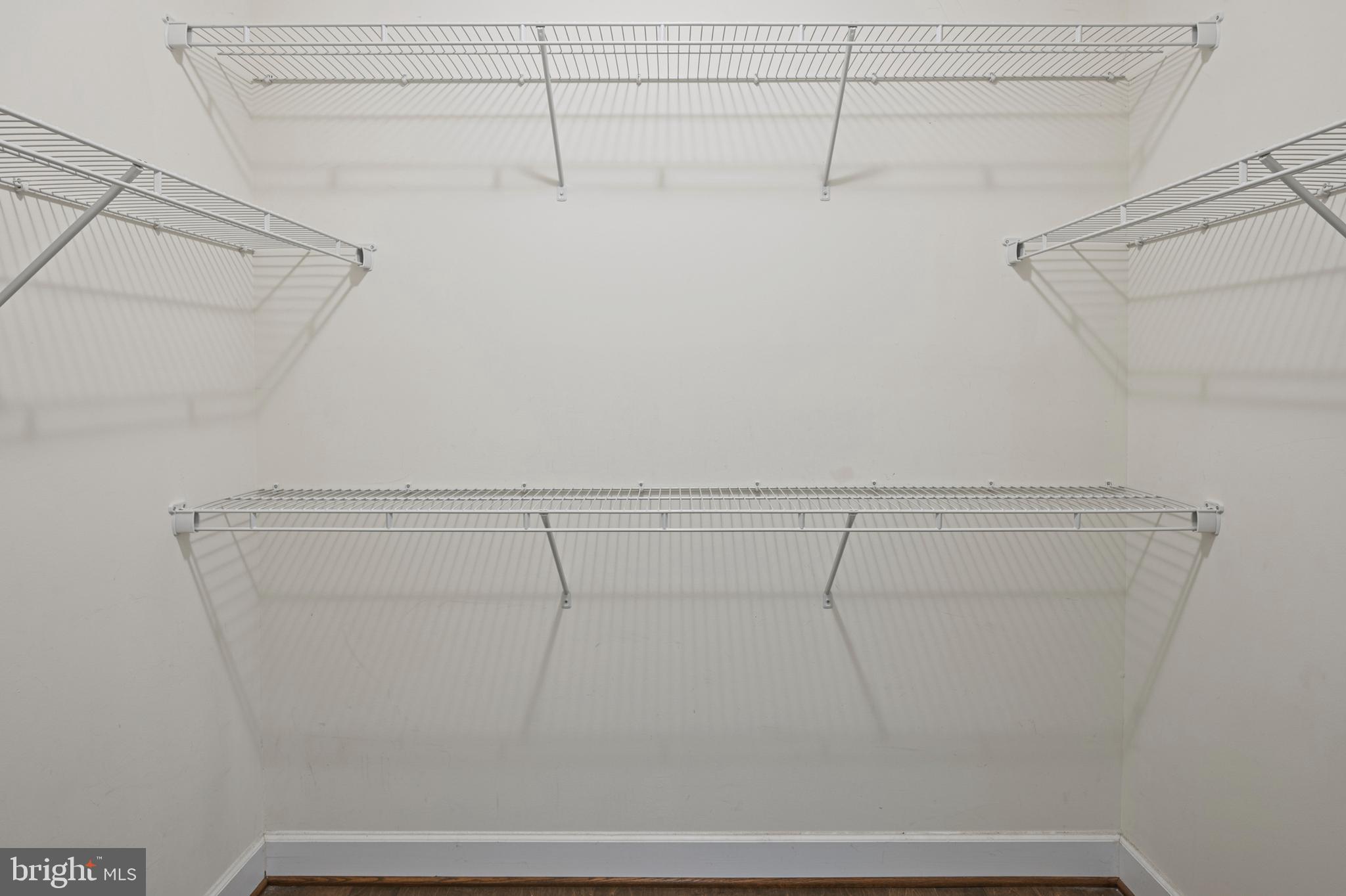 10530 Resort Road, Unit 110 Ellicott City, MD 21042 - Photo 13 of 21 a view of a room with racks on the wall