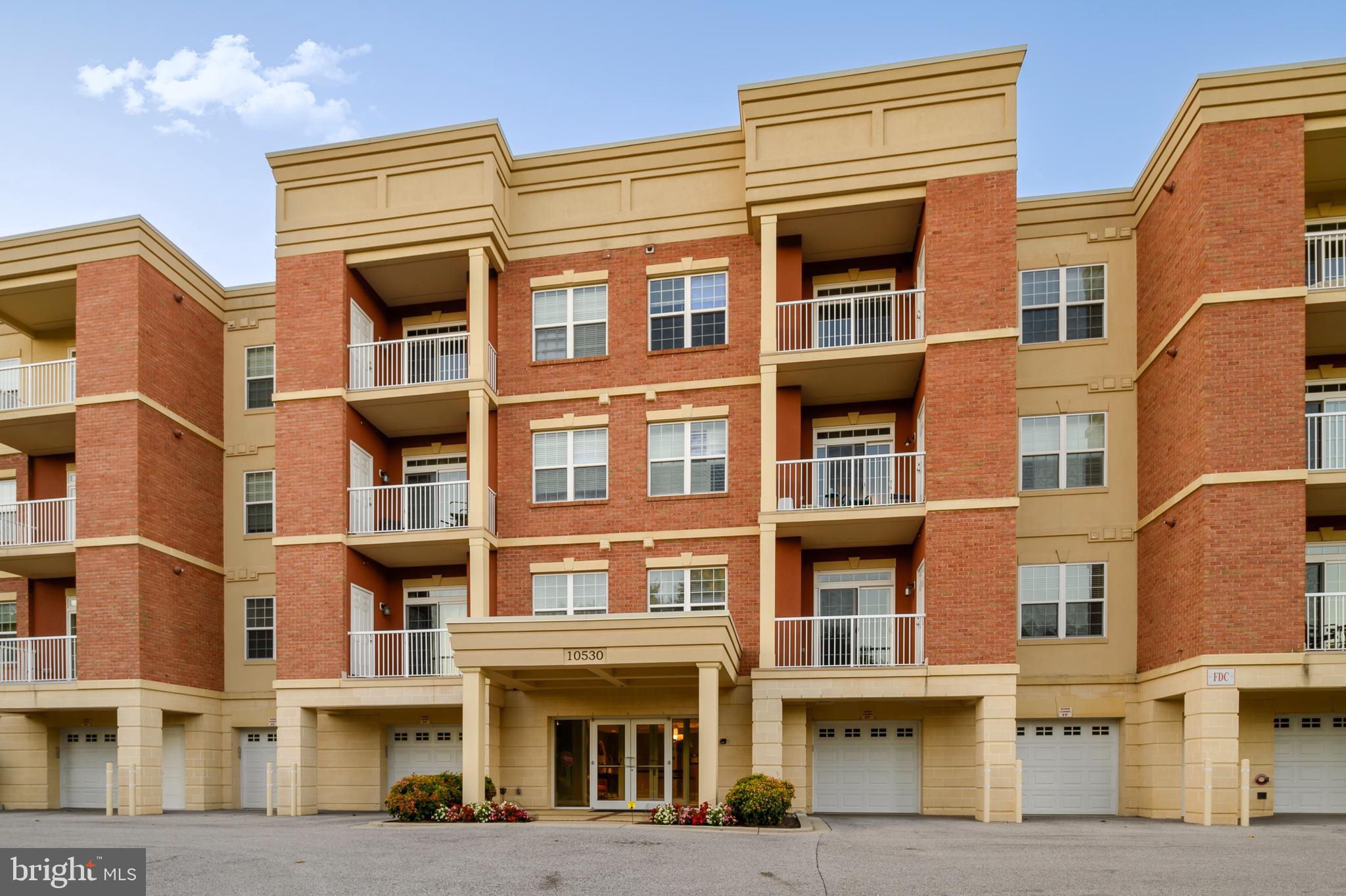 10530 Resort Road, Unit 110 Ellicott City, MD 21042 - Photo 2 of 21 a front view of a multi story building