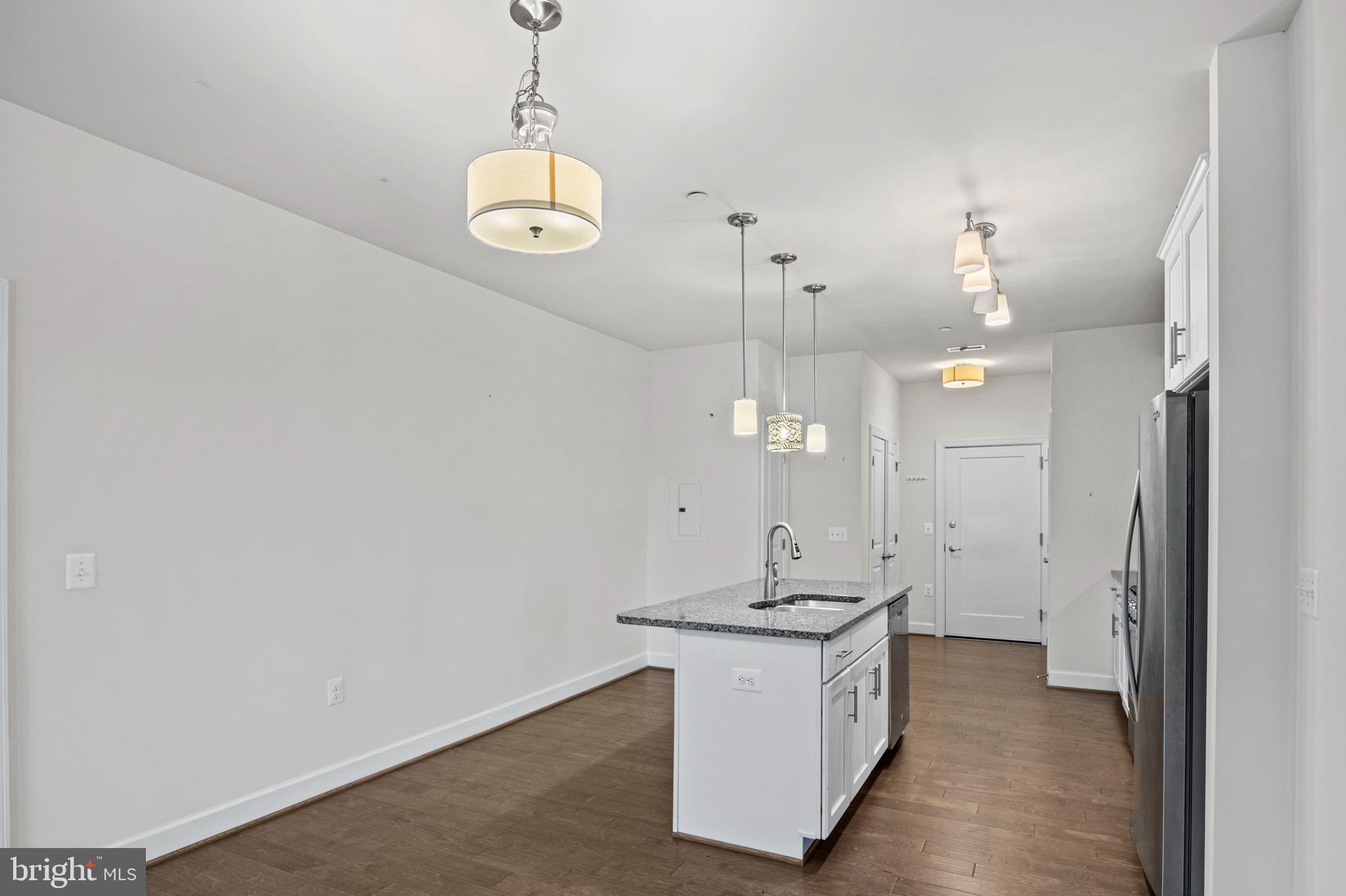 10530 Resort Road, Unit 110 Ellicott City, MD 21042 - Photo 5 of 21 a bathroom with a sink a toilet and shower