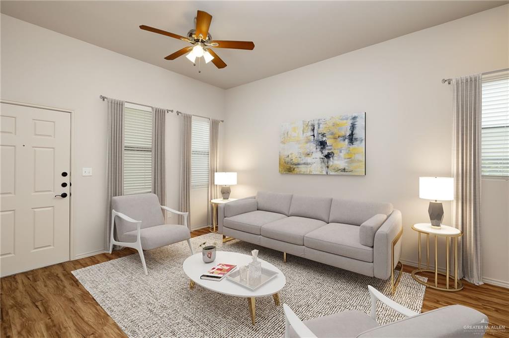 a living room with furniture and a window