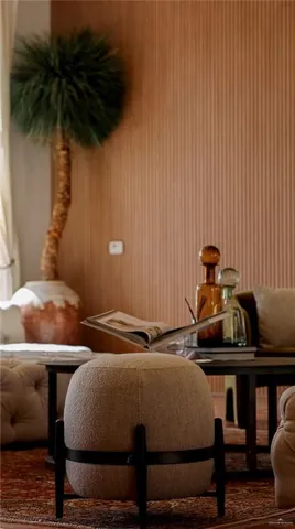 a bedroom with a bed and a table