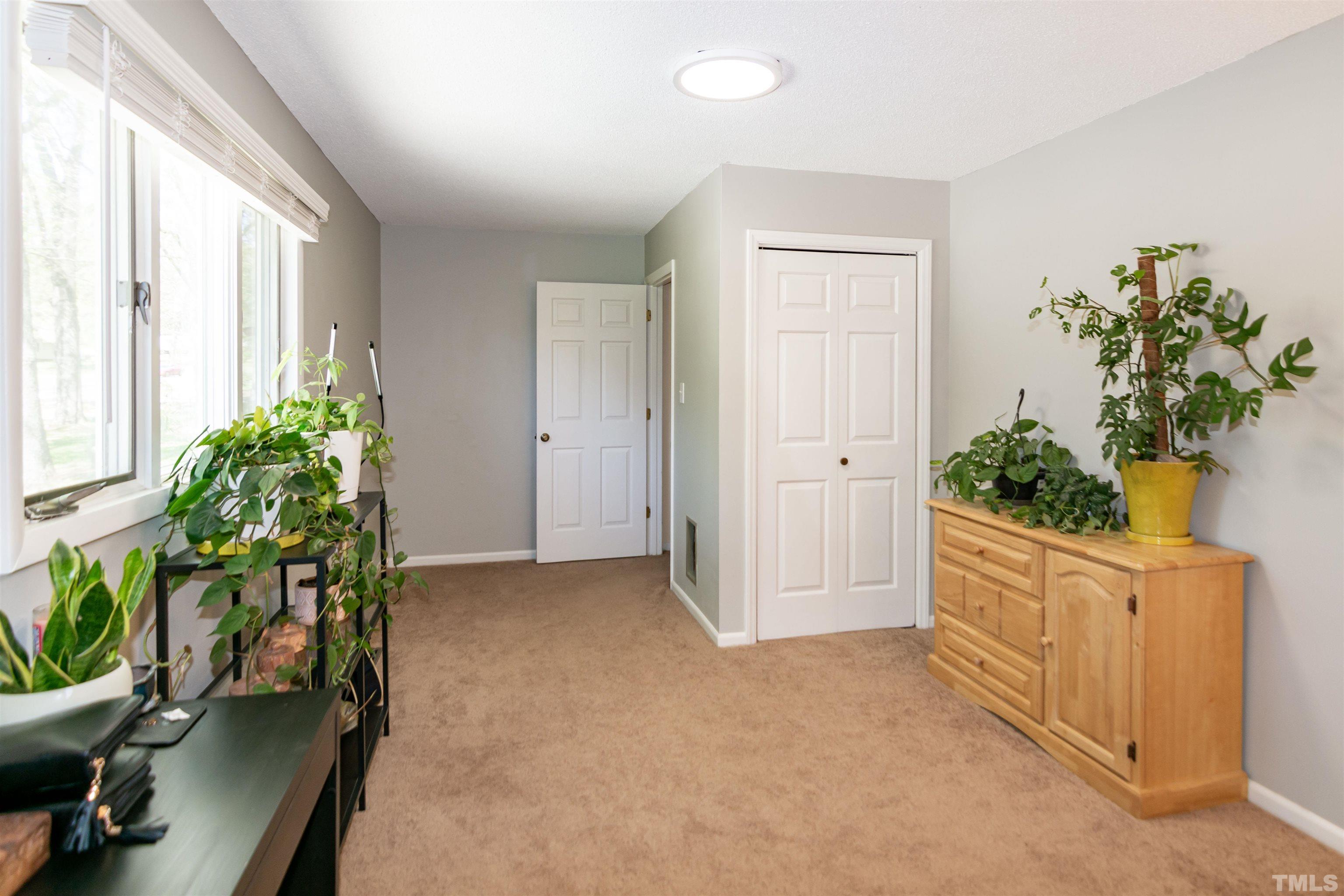 804 Stallings Road Durham, NC 27703 - Photo 34 of 37 a view of an entryway with wooden floor