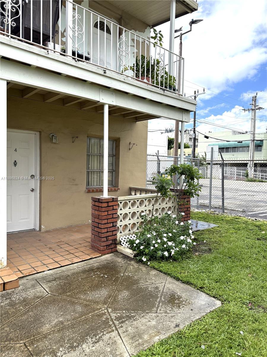 1788 Southwest 7th Street, Unit 4 Miami, FL 33135 - Photo 7 of 9 a front view of a house with garden