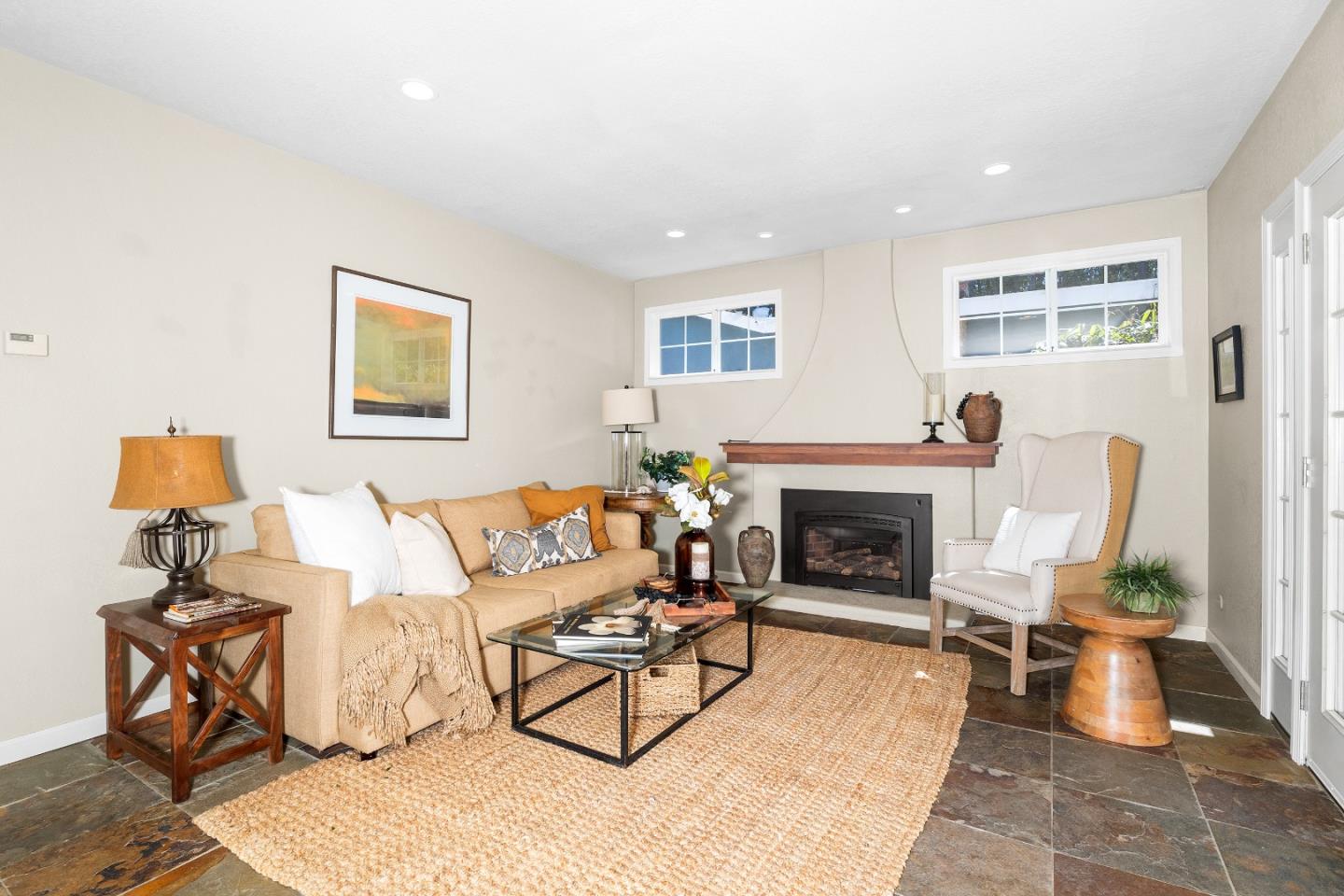 105 Wesley Street Capitola, CA 95010 - Photo 23 of 55 a living room with furniture and a fireplace
