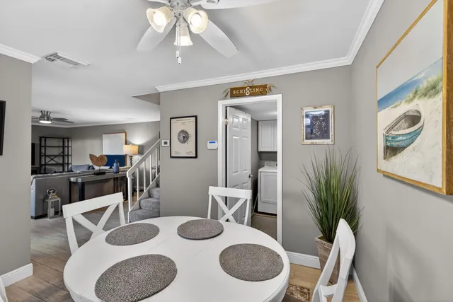 a bedroom with a large bed and a large window