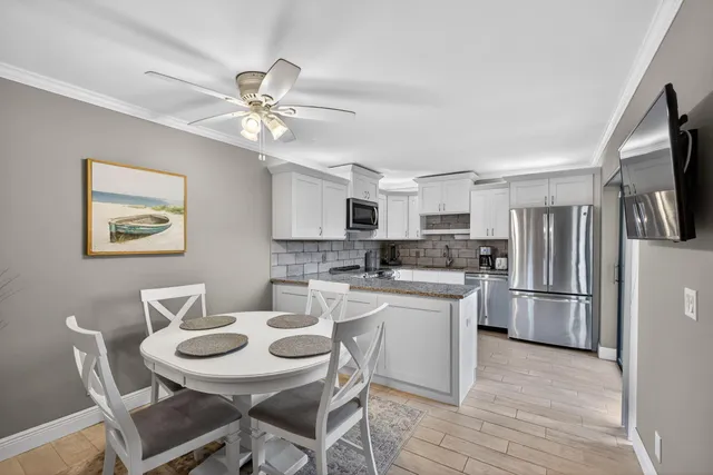 a view of storage and utility room with washer and dryer