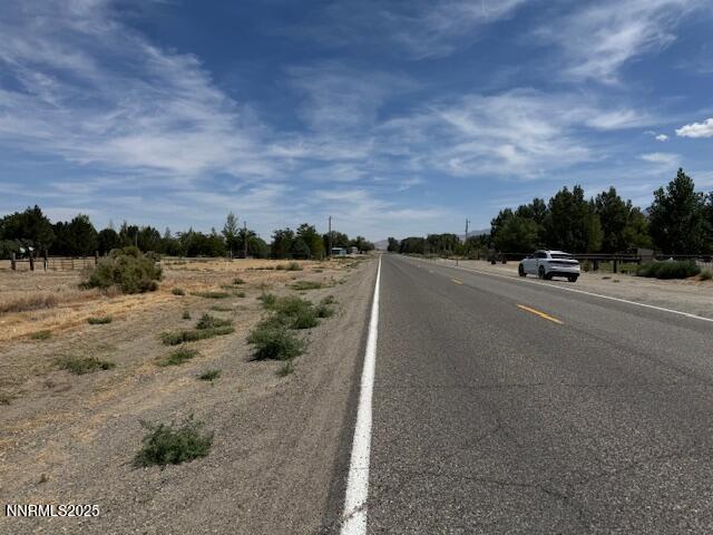 7225 West Rose Creek Road Winnemucca, NV 89445 - Photo 5 of 8 a view of a road with an ocean view