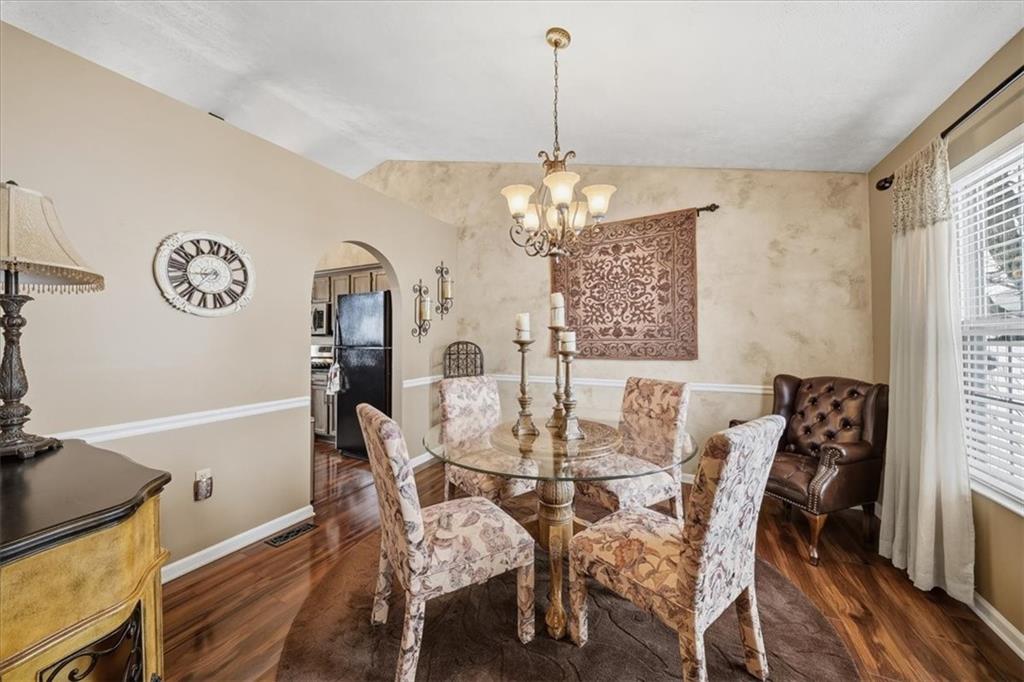 140 Cedar Ridge Drive Monaca, PA 15061 - Photo 11 of 32 a view of a dining room with furniture window and wooden floor