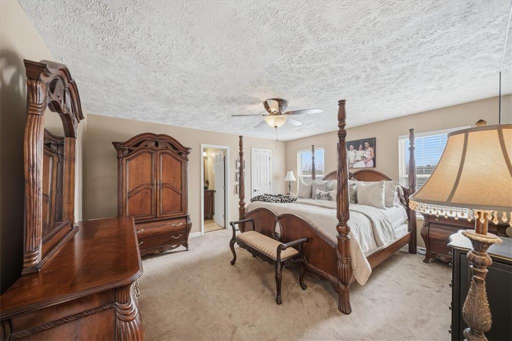 140 Cedar Ridge Drive Monaca, PA 15061 - Photo 13 of 32 a bedroom with a bed and a mirror