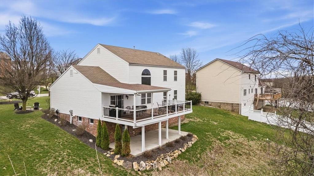 140 Cedar Ridge Drive Monaca, PA 15061 - Photo 30 of 34 a view of a house with a yard