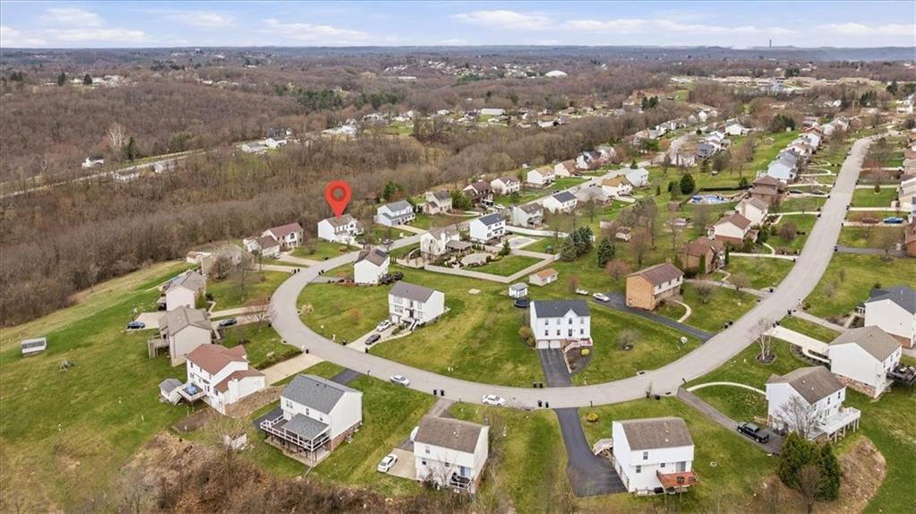 140 Cedar Ridge Drive Monaca, PA 15061 - Photo 33 of 34 an aerial view of a house with a swimming pool