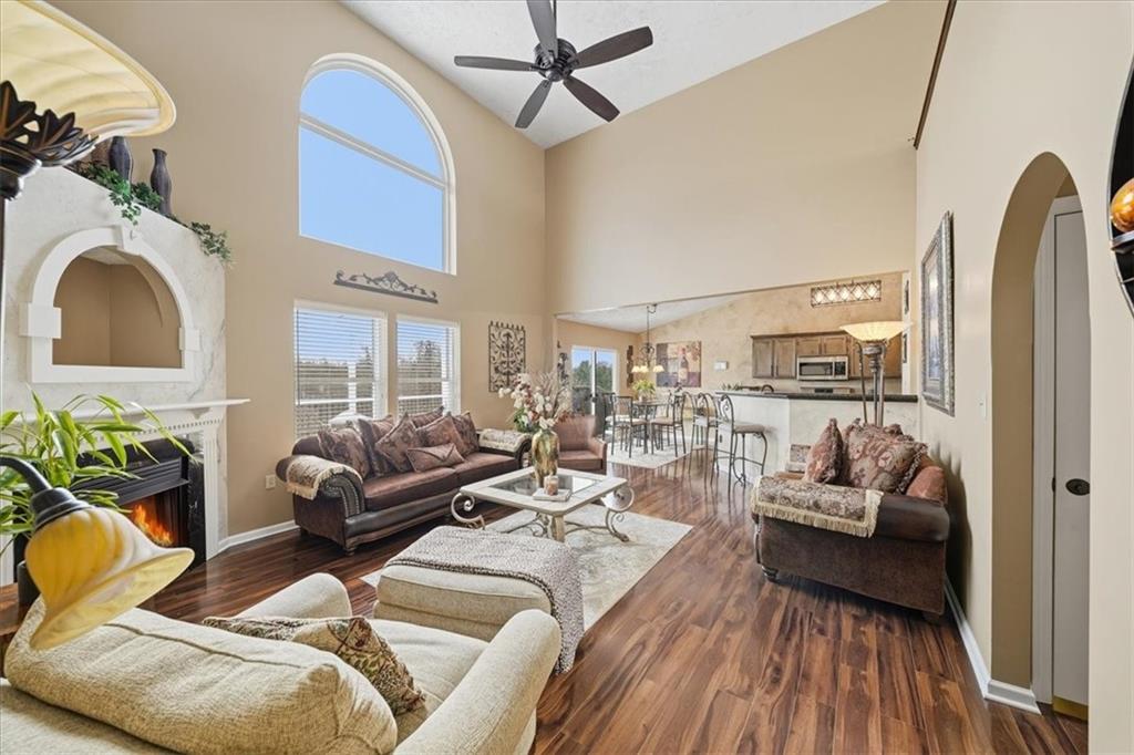 140 Cedar Ridge Drive Monaca, PA 15061 - Photo 7 of 32 a living room with furniture and a large window