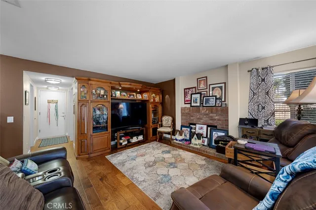 a bedroom with a bed a desk and chair