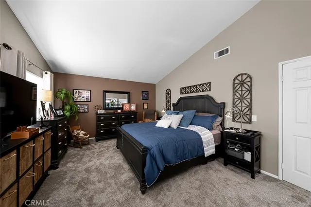 a bathroom with a sink a mirror and a window