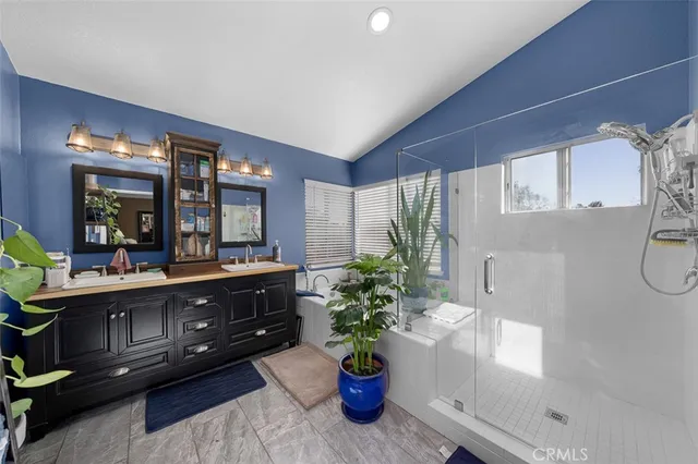 a outdoor living space with furniture and flowers