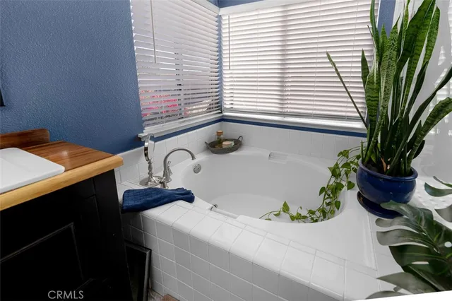 a view of a house with outdoor space and sitting area