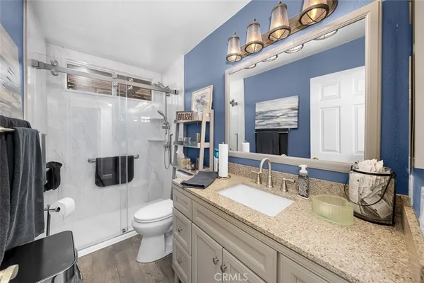 a view of a backyard with sitting area