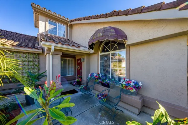 a front view of a house with a porch