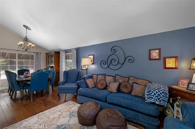 a kitchen with stainless steel appliances granite countertop sink stove top oven and cabinets
