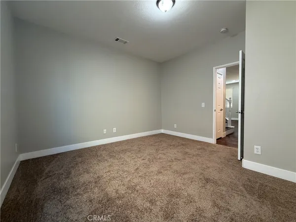 an empty room with an entryway