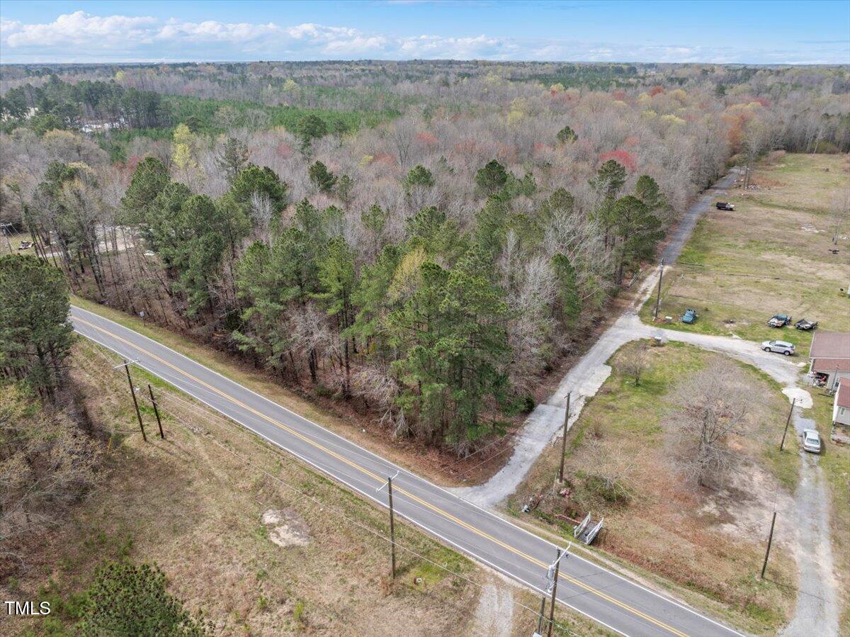 0 Warner Bridge Road Garysburg, NC 27831 - Photo 6 of 19 a view of a yard with a wooden bridge