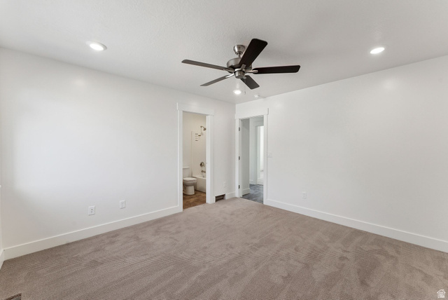 1615 North Angel Street West Layton, UT 84041 - Photo 7 of 22 Unfurnished bedroom with a ceiling fan, carpet, ensuite bathroom, and recessed lighting