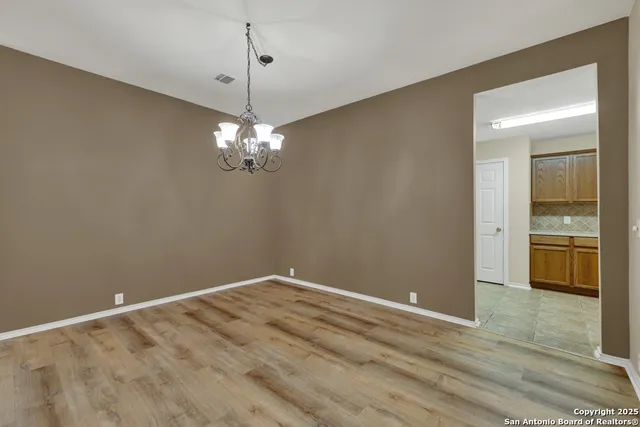 a view of a chandelier in a room