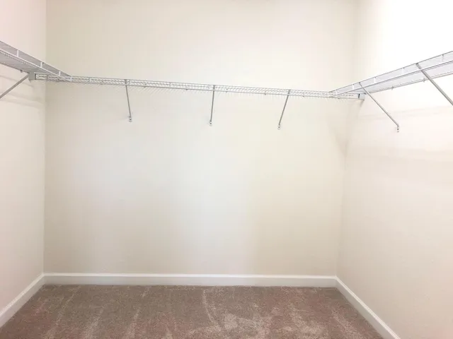 a bathroom with a bathtub a sink a toilet and a shower