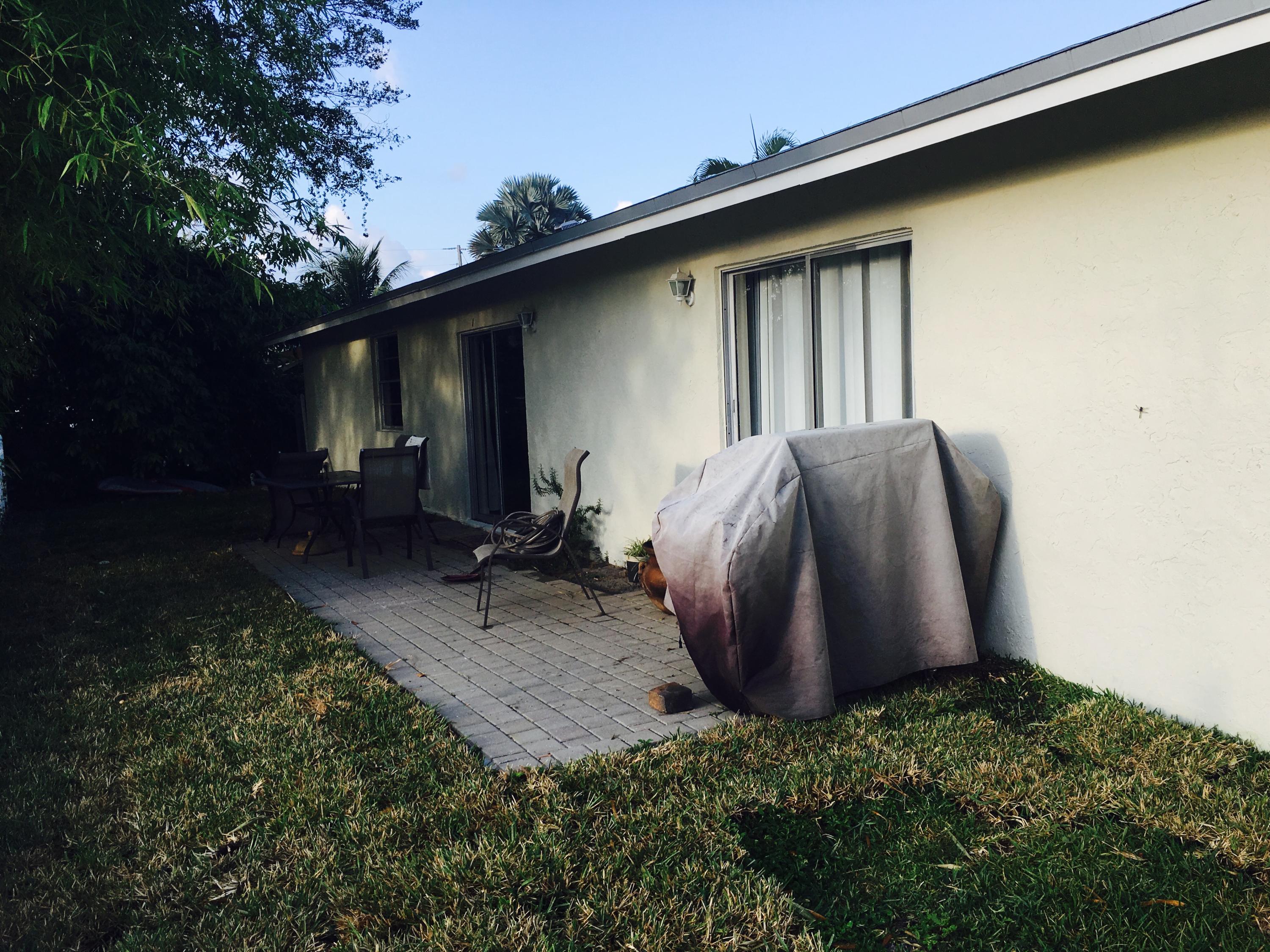 6714 Rigger Road Lake Worth, FL 33462 - Photo 19 of 26 Back home open patio overlooking water