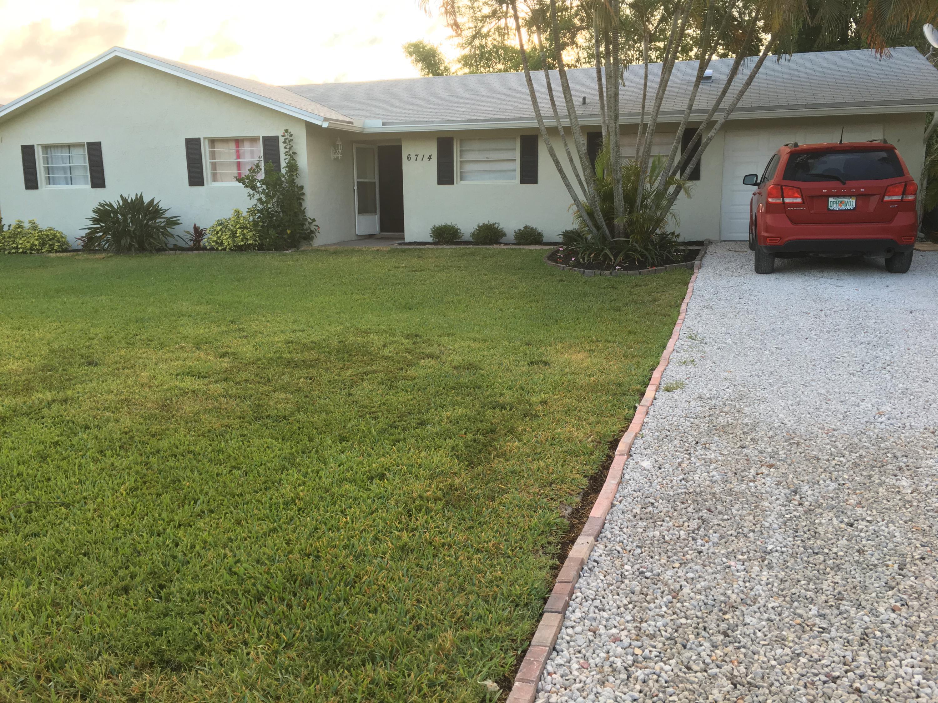 6714 Rigger Road Lake Worth, FL 33462 - Photo 2 of 26 Front Exposure