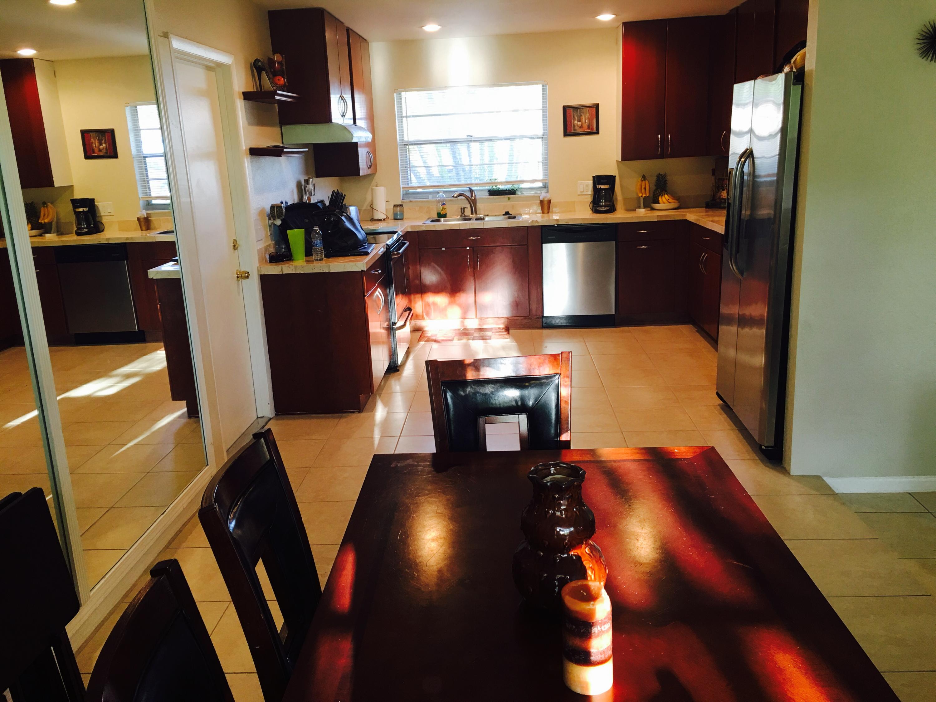 6714 Rigger Road Lake Worth, FL 33462 - Photo 5 of 26 Dining Room/Kitchen