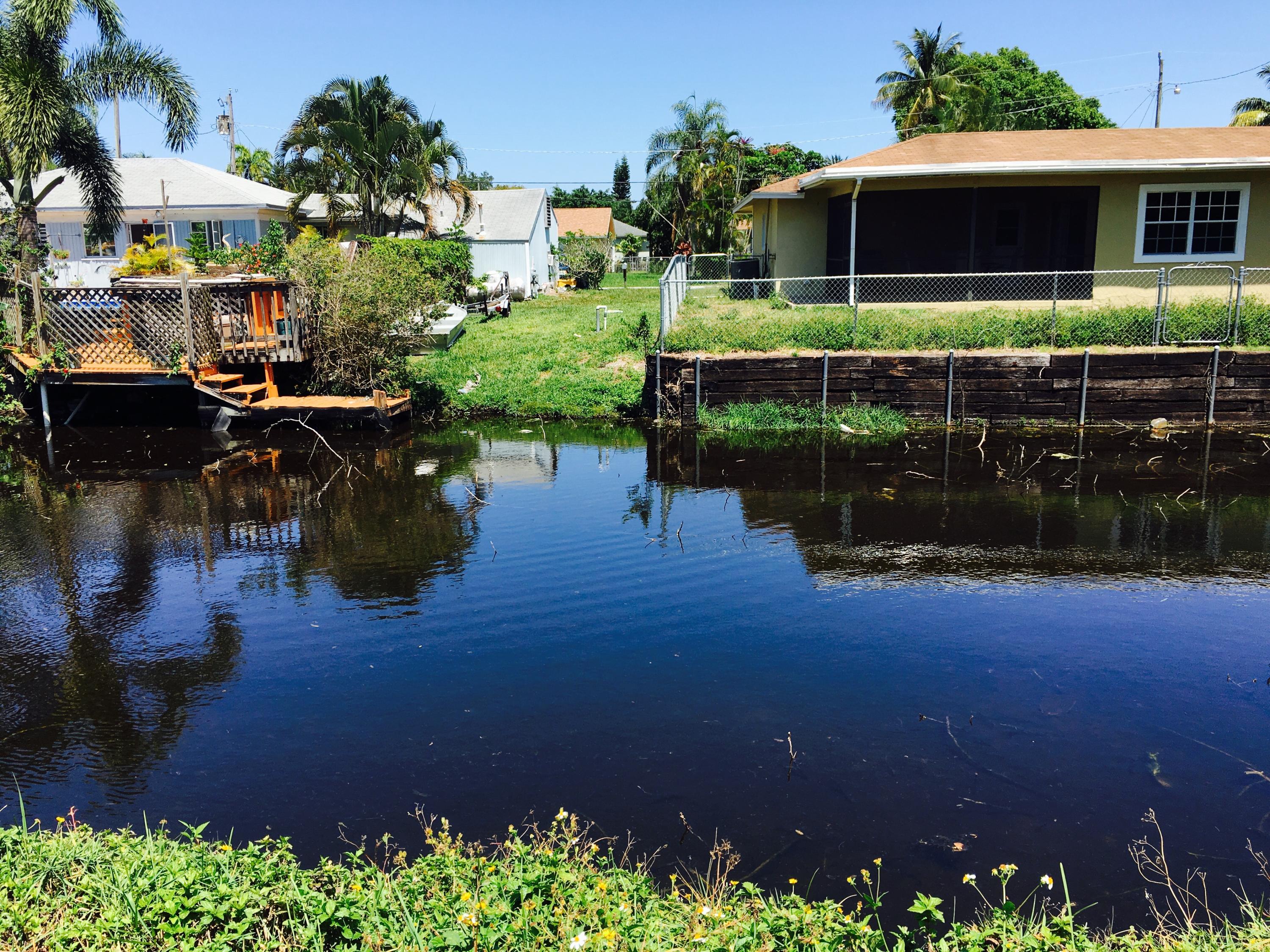6714 Rigger Road Lake Worth, FL 33462 - Photo 7 of 26 Canal in back of property