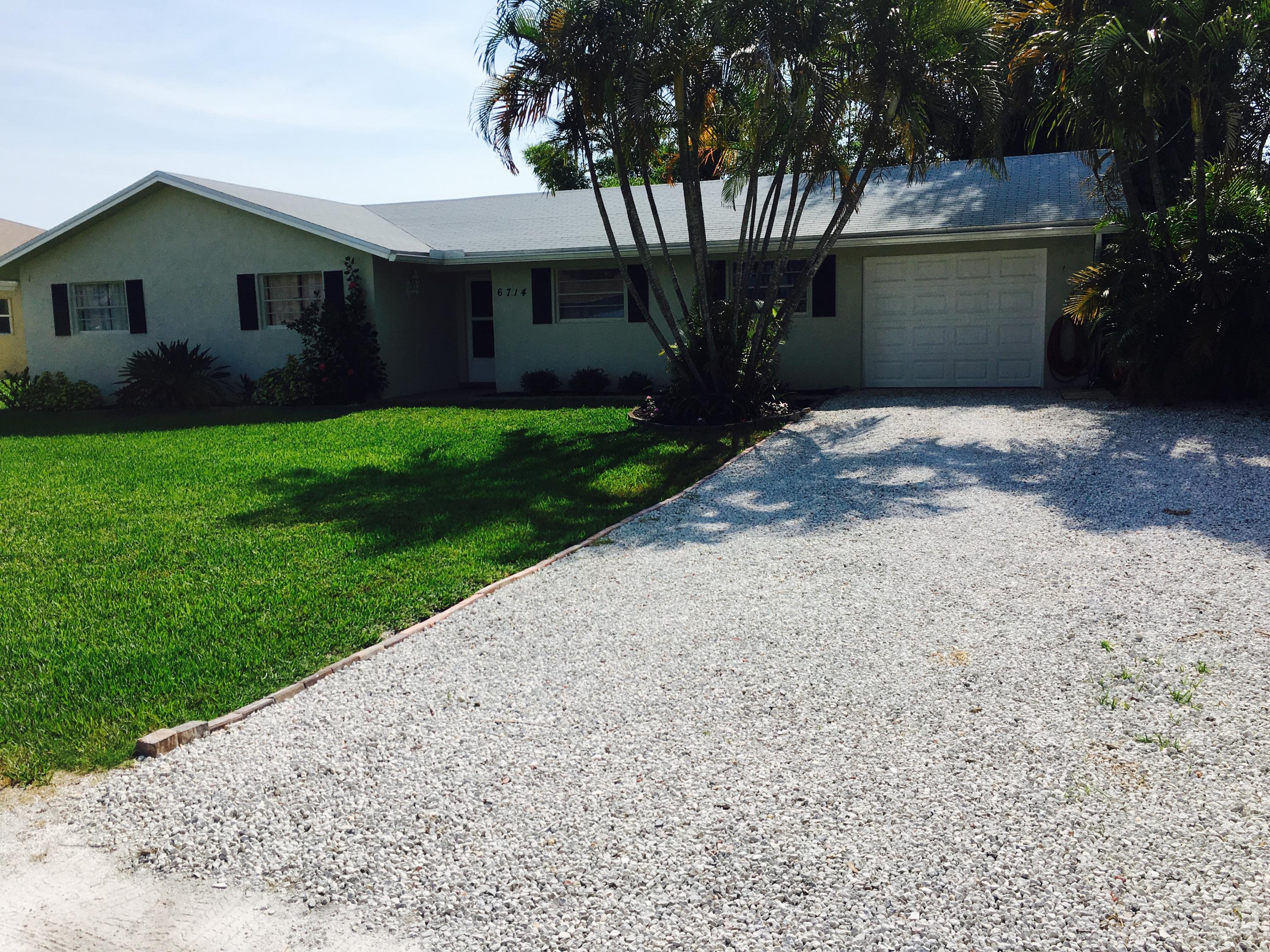 6714 Rigger Road Lake Worth, FL 33462 - Photo 9 of 26 Front