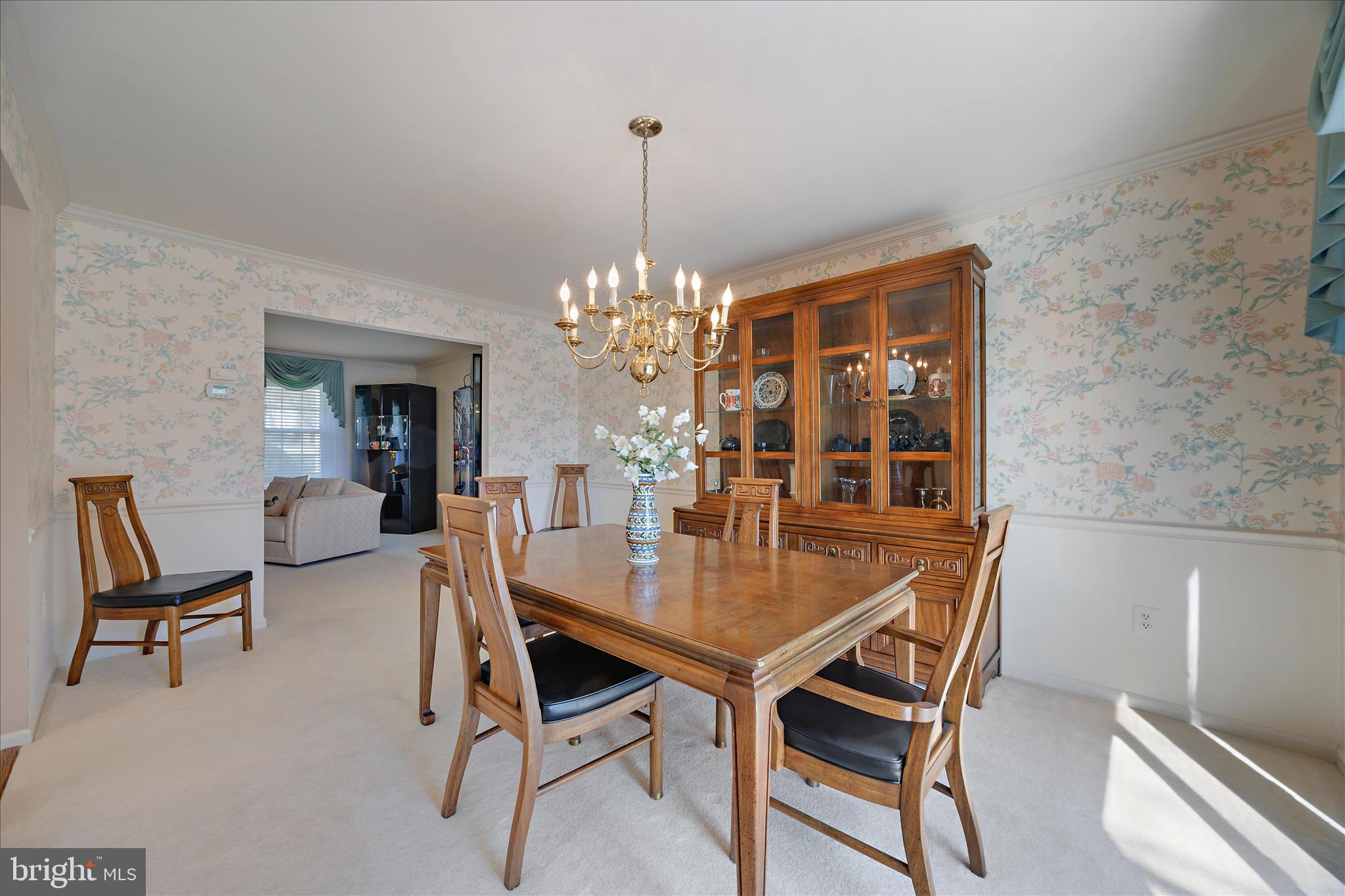 253 Milthorn Court Riva, MD 21140 - Photo 13 of 71 a view of a dining room with furniture and a chandelier
